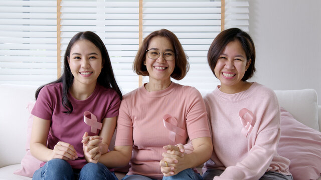 Diversity group asia happy people or senior mature lady and teen girl sit at home sofa smile look at camera to help fight prevent or protect female disease issue relief, patient health care benefit.