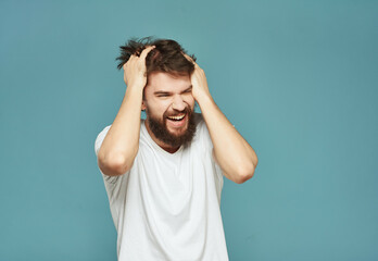 emotional man in a white t-shirt expressive look discontent Lifestyle