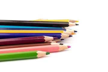Colored pencils, school supplies drawing, pattern, copy space.