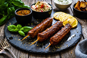 Cevapcici - Balkan shashlik with jasmine rice, tzatziki and lemon