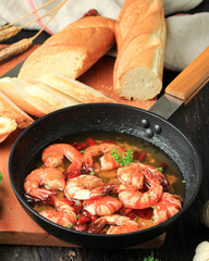 Gambas al aJillo. Shrimp Scampi. Traditional Spanish tapa with Prawns Cooked in Oil with Garlic and Chilli.