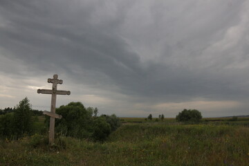 Fototapeta na wymiar Orthodox cross in the field