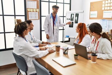 Group of young doctor discussing in a medical meeting at the clinic office.