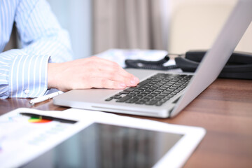 working on laptop, close up of hands of business man