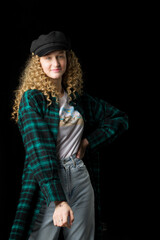 Beautiful girl standing with hands on her waist