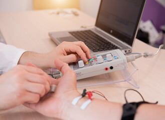 Patient nerves testing using electromyography at medical center