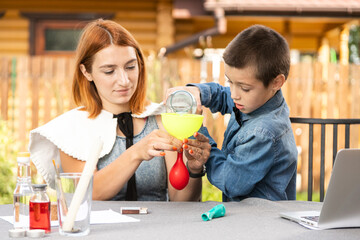 Mom and son are doing physical experiments at home. An experience with a child about which of the...