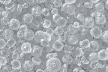 White table salt crystals under microscope, image width 9mm, abstract science background