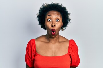 Young african american woman wearing casual clothes afraid and shocked with surprise expression, fear and excited face.