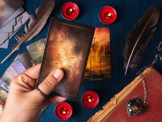 Tarot cards and esoteric concept. Magic rituals. Mystical table with details. View from above....