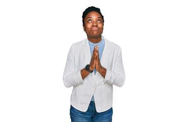 Young african american woman wearing business clothes begging and praying with hands together with...