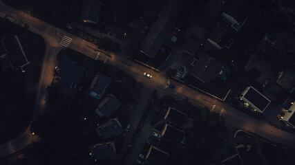 Aerial view of a junction with road markings at night. Bridges, roads, or Streets in transportation concept. Structure shapes of architecture
