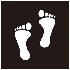 Footprint vector icon on black background