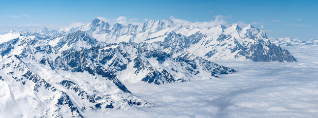 Switzerland, Panoramic view on Snow Alps and Blue Sky around Titlis mountain