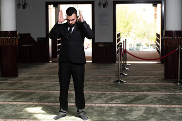 Muslim Man is Praying in the Mosque