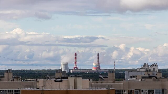 pipes of power plant and factory, steam and smoke from pipes. production and pollution
