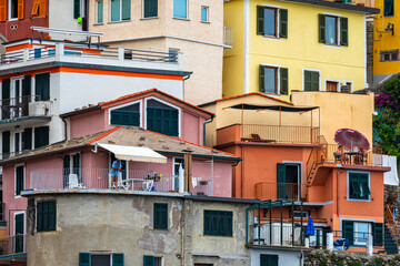 colorful house, buildings and old facade with windows in small picturesque village Manarola Cinque terre in liguria