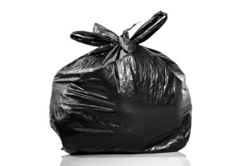 Black trash bag isolated on white background.