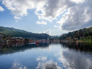 The beautiful boat in the lake at Ban Ruk Thai, which Yunnan Chinese Village at Mae Hong Son, Thailand.