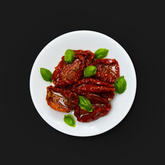 White plate with Dried tomatoes isolated
