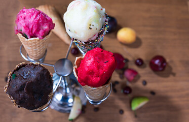 Fruity ice creams and cups, serving and eating
