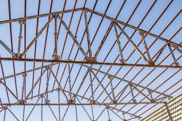 Roof metal structure against the sky.