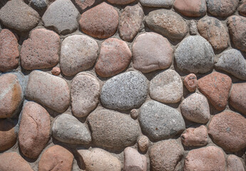 A fence made of large boulders. High resolution photo.
