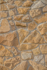 Stone wall texture. Old castle stone wall texture background. Stone wall as background or texture. Part of a stone wall for background or texture.