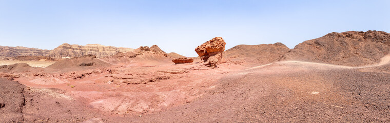 Fototapeta premium Fantastic rock - Mushroom - formed as a result of centuries-old washing out of rocks by groundwater in Timna National Park near Eilat, southern Israel.