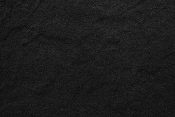 Dark grey black slate background or texture. Black granite slabs background.