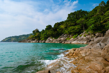 Fototapeta na wymiar surin beach, sea, stones, phuket, thailand