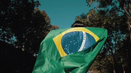 Black woman with Brazilian flag, independence day - Powered by Adobe