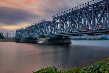 Fototapeta na wymiar Dawn over the railway bridge in Voronezh