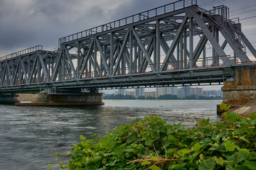 Fototapeta premium Dawn over the railway bridge in Voronezh