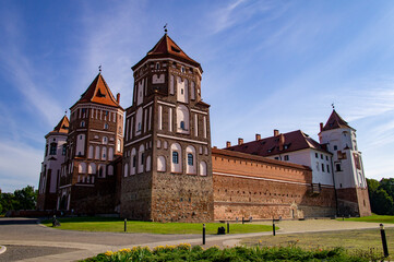 Old beautiful medieval castle fortress with towers. Ancient european architecture