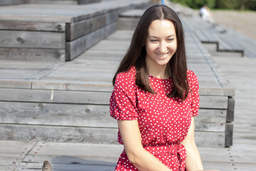 Fototapeta premium happy woman sitting outside