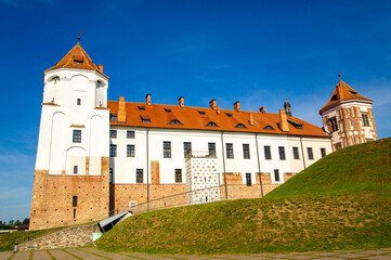 Fototapeta premium Old beautiful medieval castle fortress with towers. Ancient european architecture
