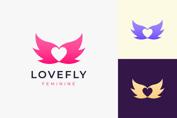 Obraz premium Cosmetic or health logo in simple love and wing shape