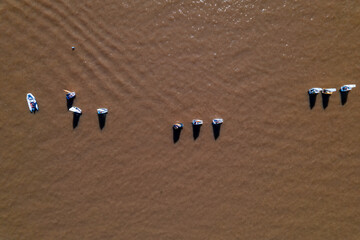 Aerial view of small sailboats for boys, called Optimist

