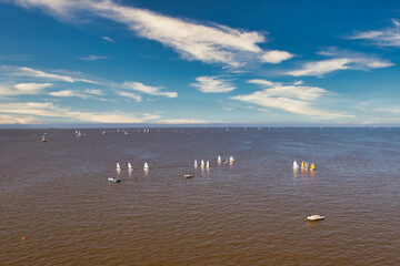 Aerial view of small sailboats for boys, called Optimist
