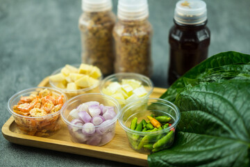 Thai appetizer Miang Kum leaf-wrapped bite-size for eat