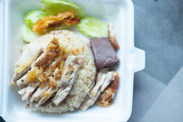 Steamed chicken soup and fried chicken on rice steamed