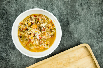 Egg crab and crab meat chili paste in white bowl