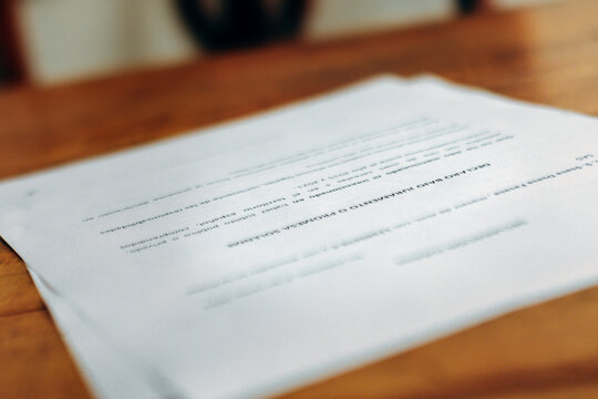 Photograph Of A Sample Sworn Affidavit On A Wooden Table