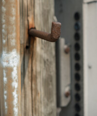 close up of a telephone pole climber spike