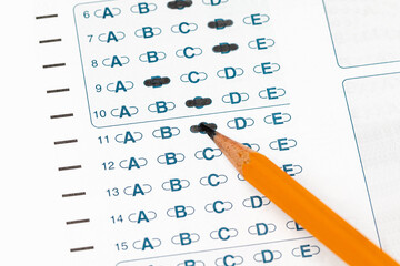Bubble sheet answer form with pencil. Education, test and exam concept
