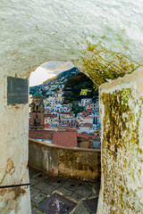 Amalfi, Italy - January 19, 2017: View of the town of Amalfi from archway of a typical labyrinth of medieval streets