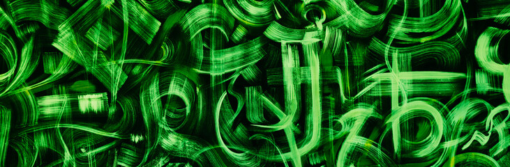 Abstract background with graffiti on the wall. Modern hipster banner in green with painting.