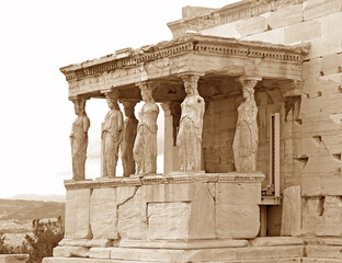 Obraz premium The Iconic Caryatid Porch of the Erechtheum Ancient Greek Temple on the Acropolis of Athens, Greece in Sepia