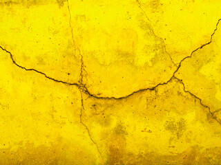 Crack yellow facade concrete wall texture with old vintage style, Blank of shiny yellow paint...